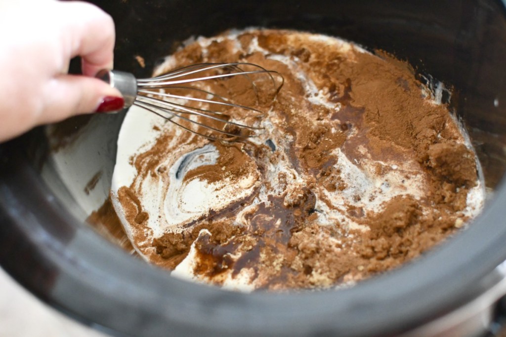 whisking gingerbread latte in slow cooker