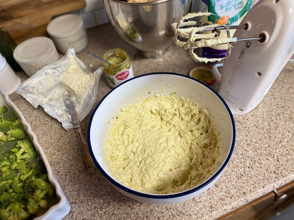 pesto cream sauce in mixing bowl