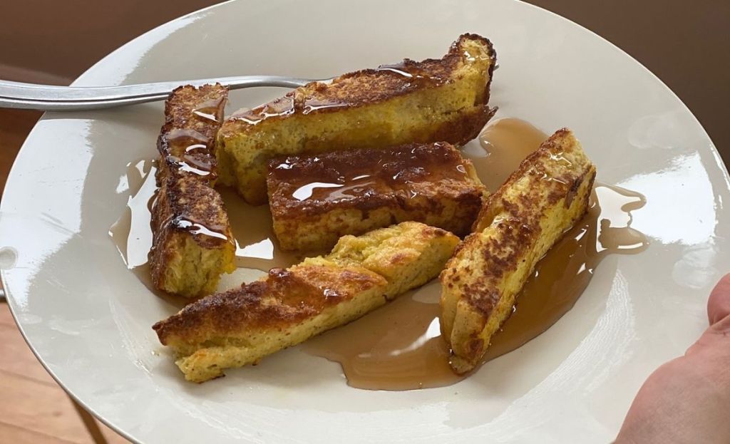 A plate of keto french toast with syrup