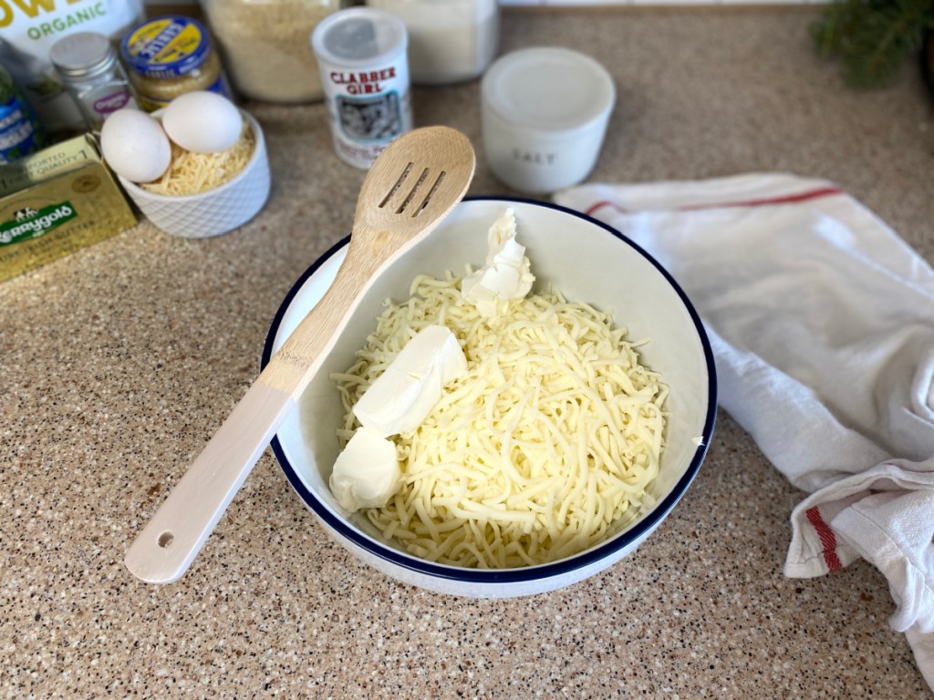 mozzarella cheese and cream cheese in mixing bowl