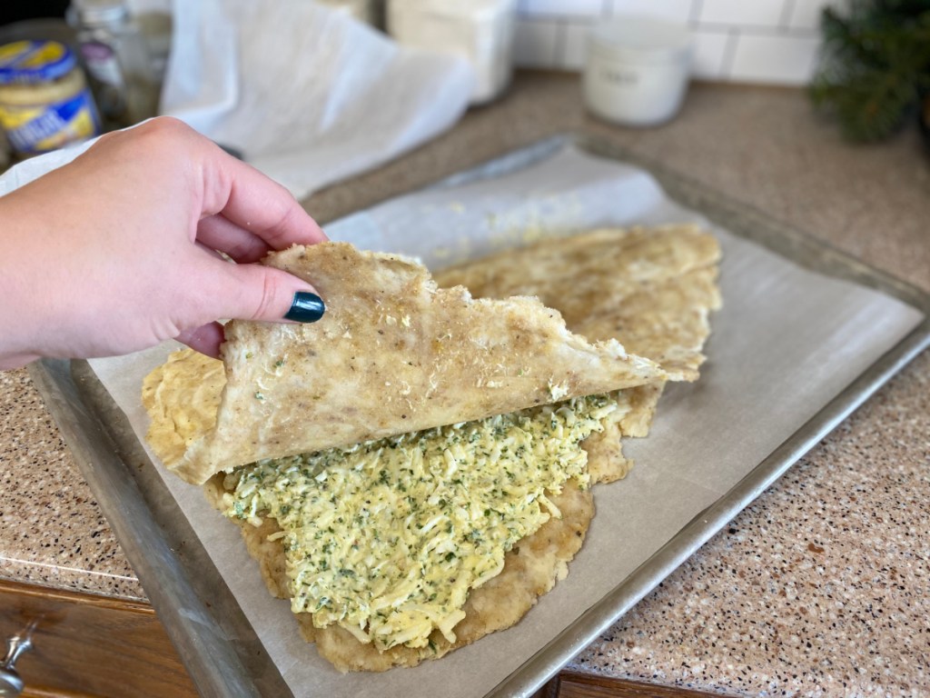 adding top dough to christmas tree breadsticks