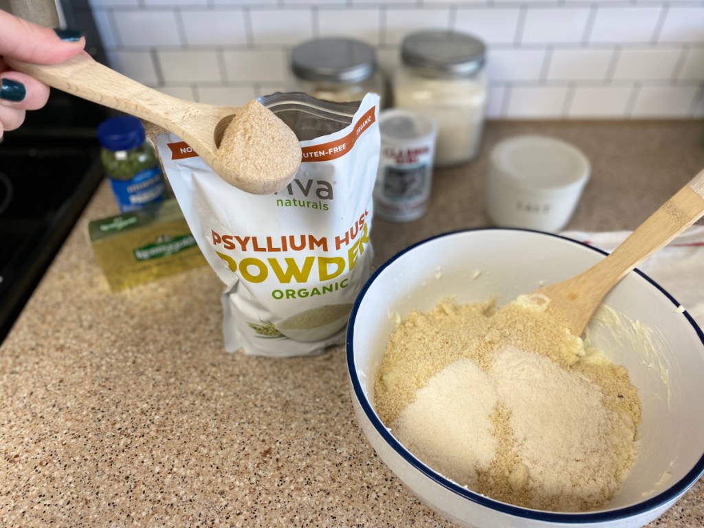 adding ingredients to mixing bowl