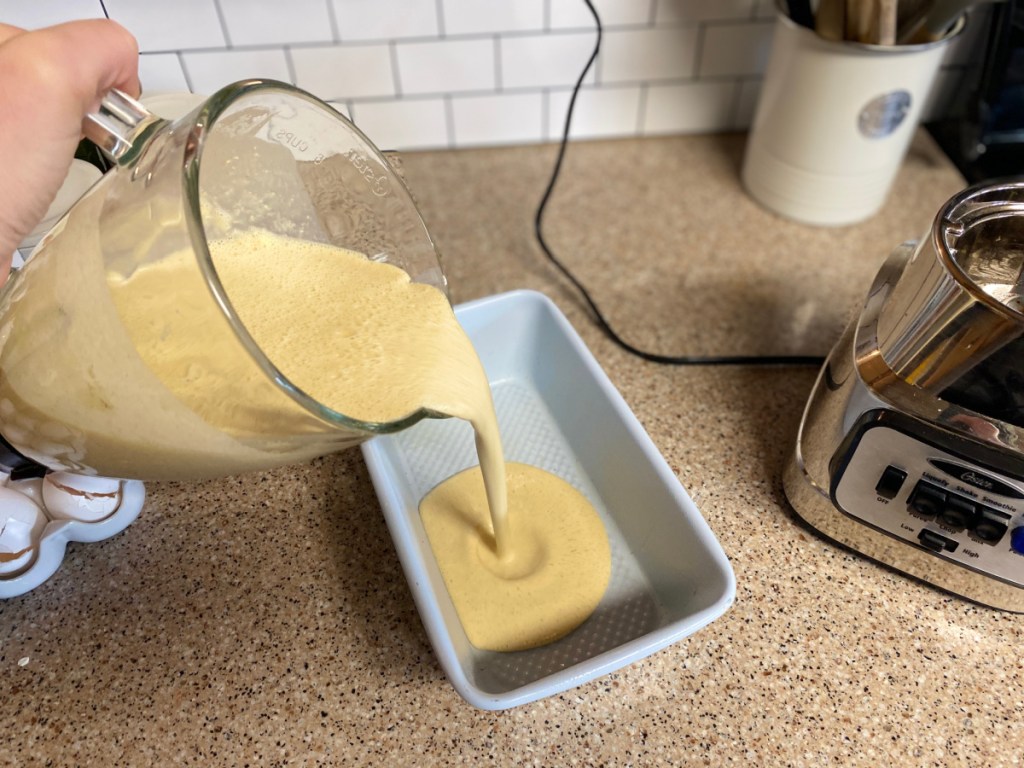 pouring batter into bread pan