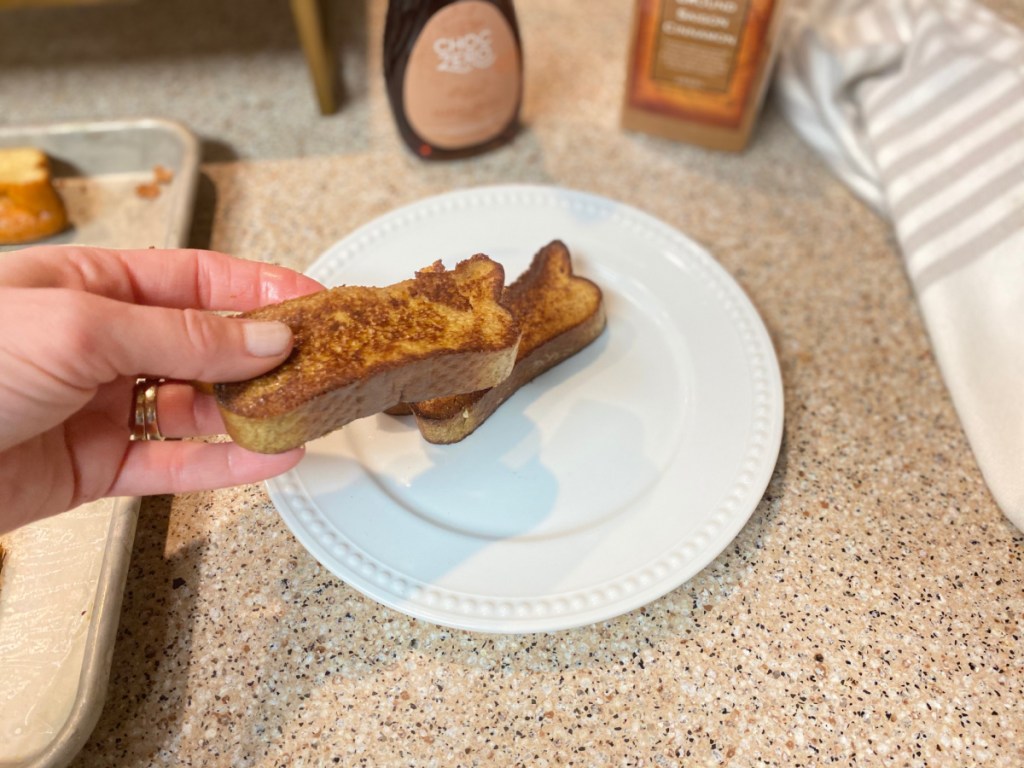 Keto french toast sticks being plated