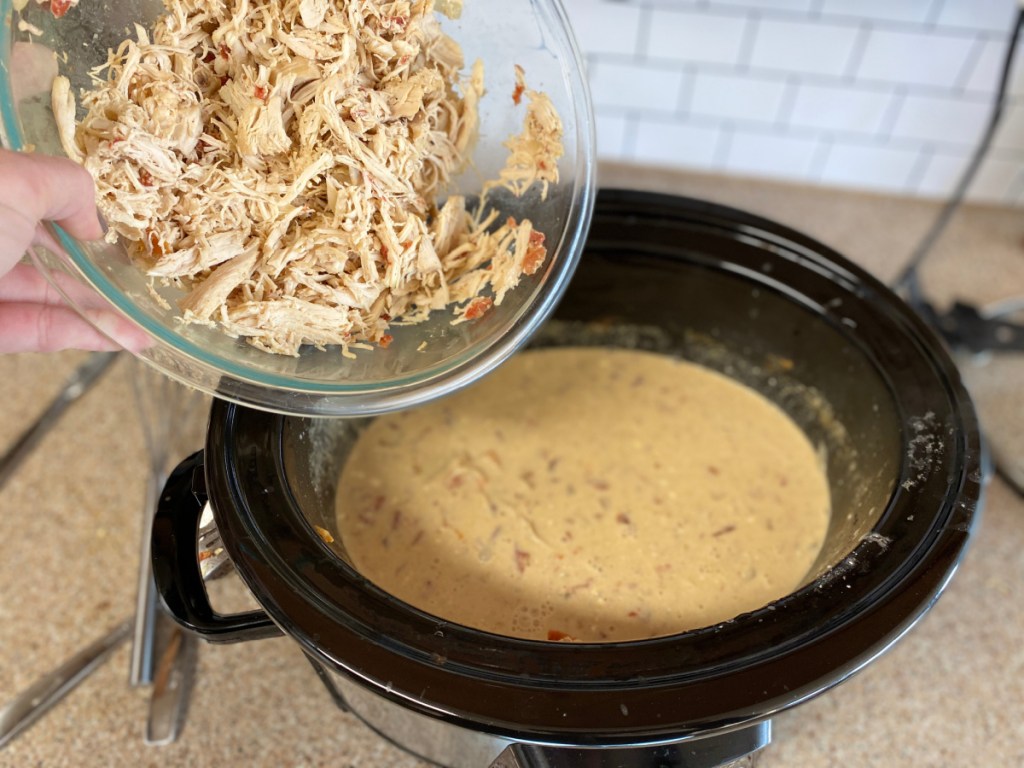 adding shredded chicken back to the slow cooker