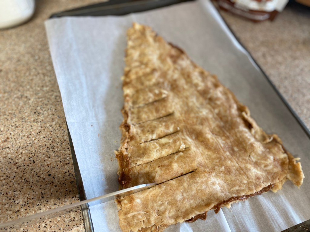 cutting slices into dough