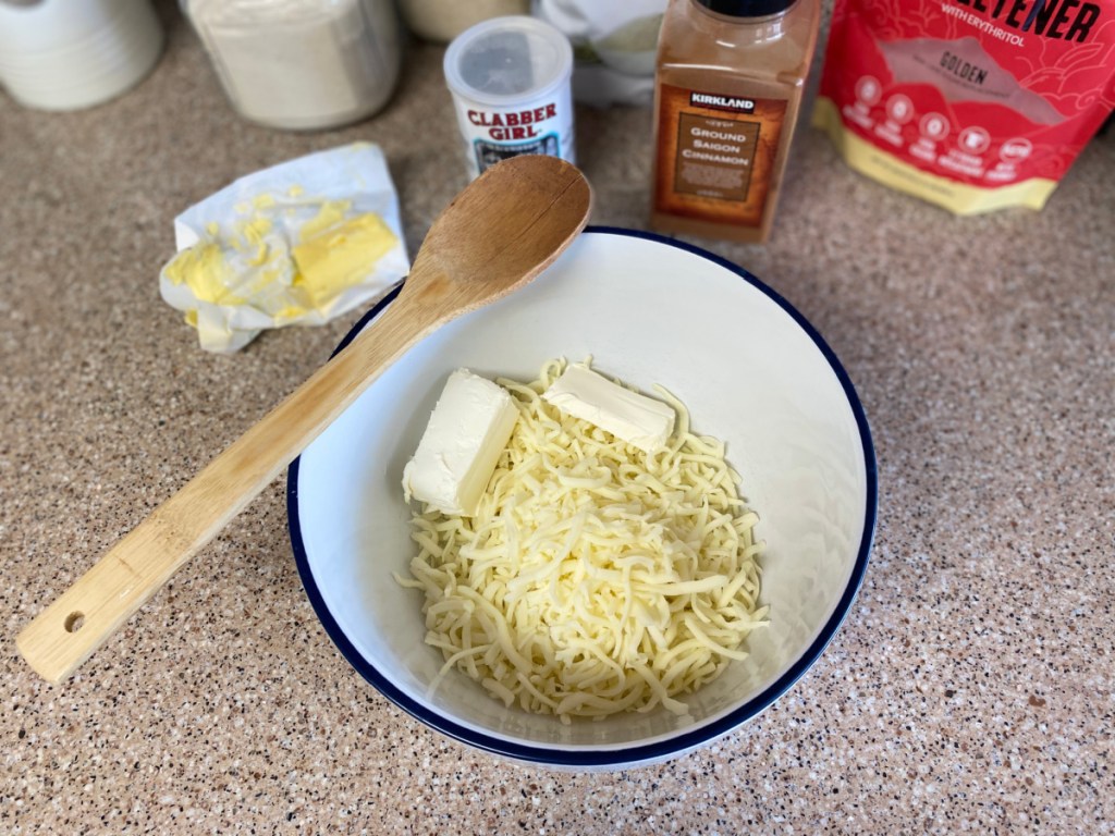 mozzarella cheese and cream cheese in a mixing bowl