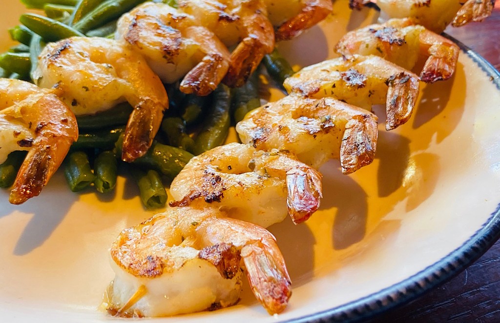 garlic shrimp skewers on plate