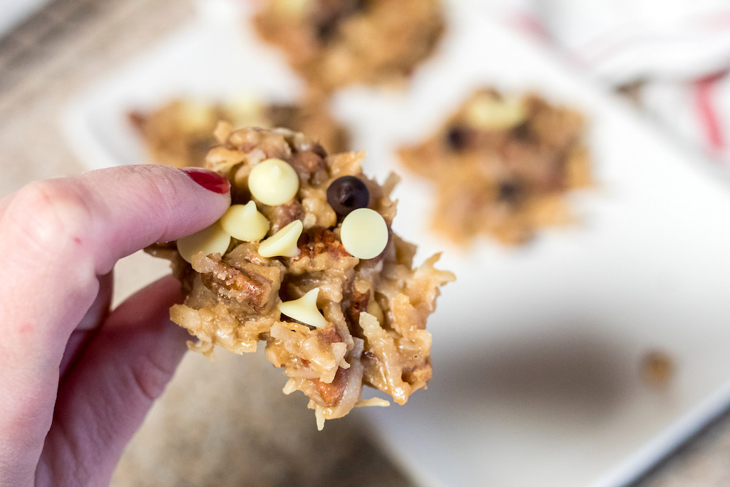 holding keto no-bake cookies with chocolate chips 