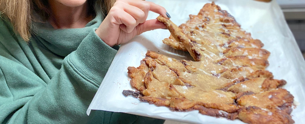 taking piece of keto Christmas tree sweet bread 