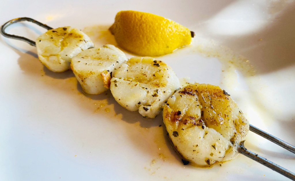 grilled scallops on plate