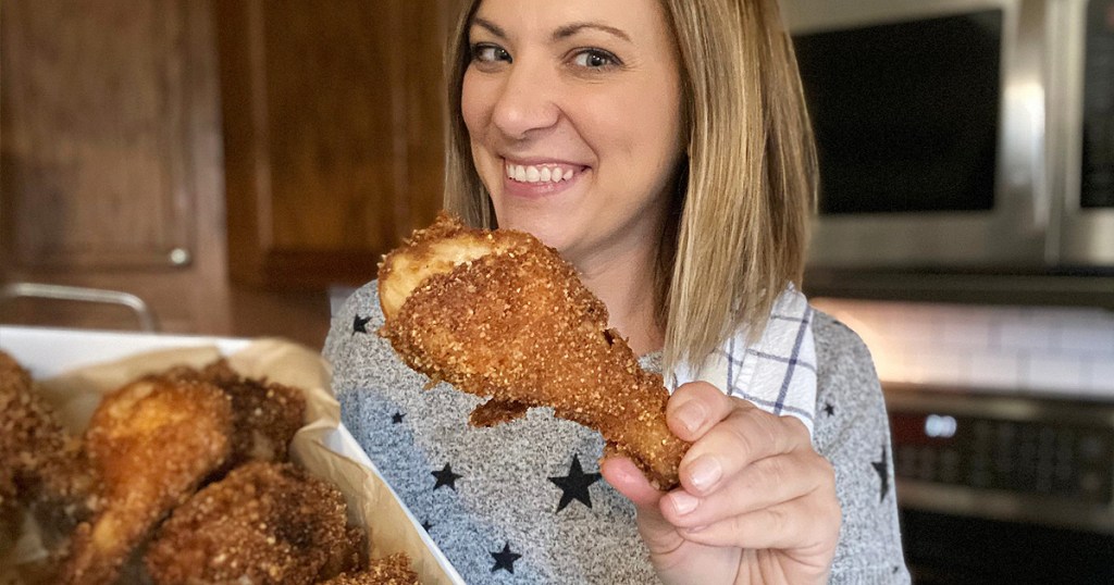 woman holding keto fried chicken