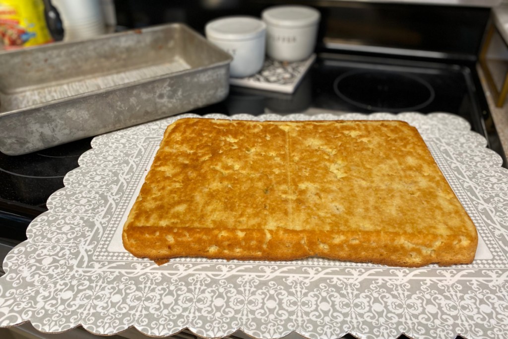 keto sheet cake on a cake plate cooling