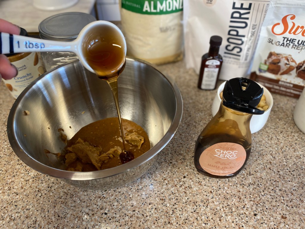 ChocZero syrup being added to mixing bowl