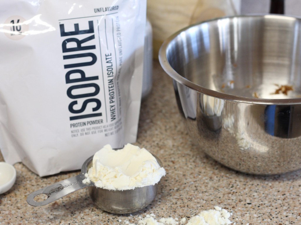 adding isopure protein powder to mixing bowl