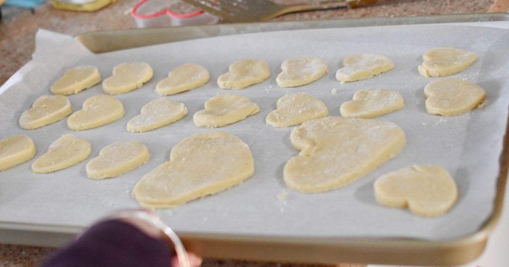 cut out keto sugar cookies on a sheet pan