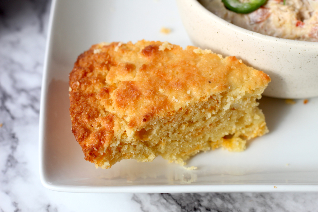 keto cornbread on plate by soup