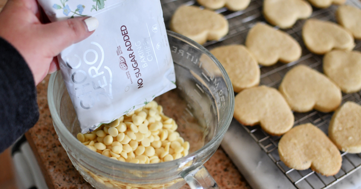 pouring choc zero white chips into a bowl