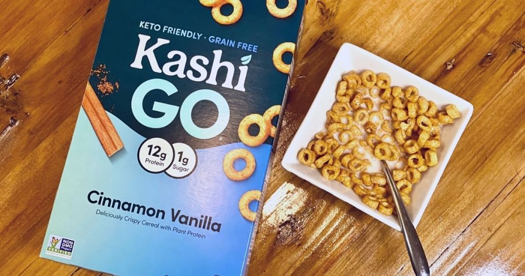 A bowl of keto cereal next to the box