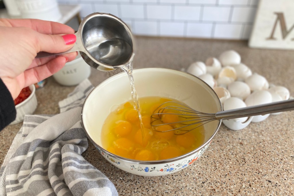 adding water to eggs