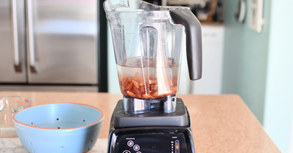 learn how to make almond milk by blending almonds with water in a vitamix