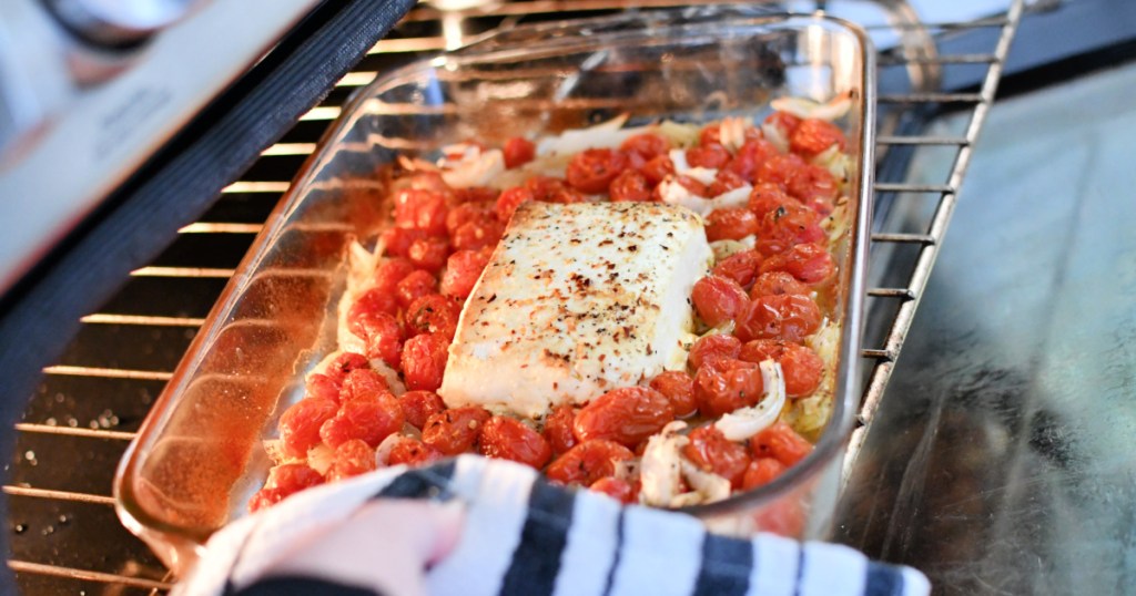 baked feta cheese with tomatoes in the oven