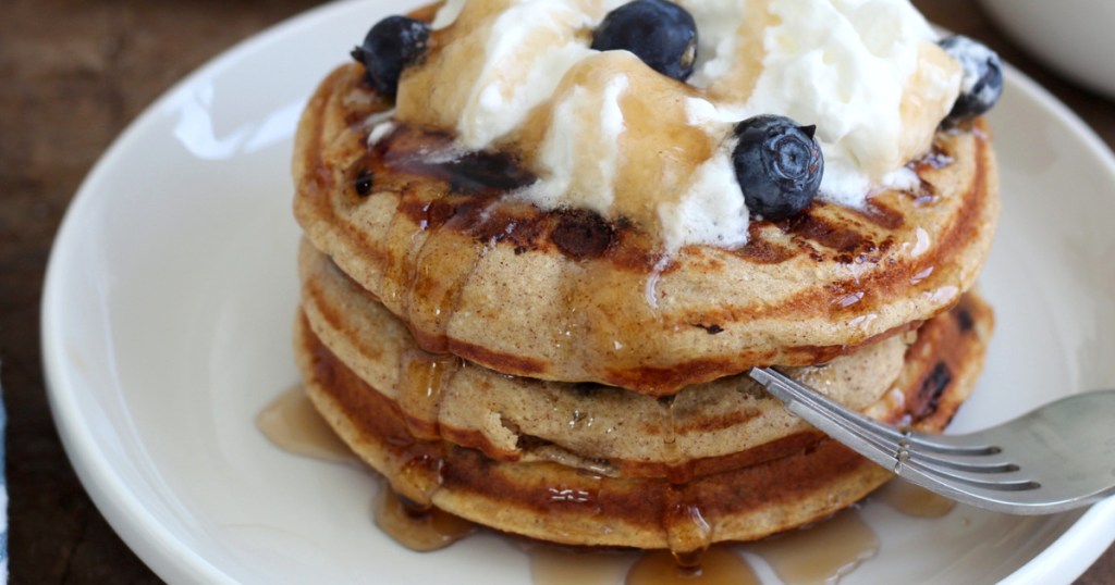 blueberry chafe with syrup and whipped cream 