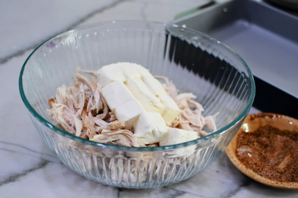 cream cheese with chicken in a bowl