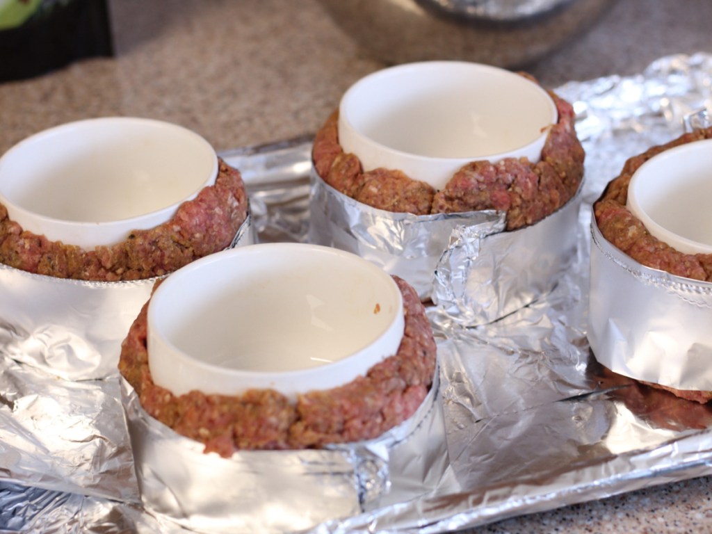 hamburger bowls on a baking sheet