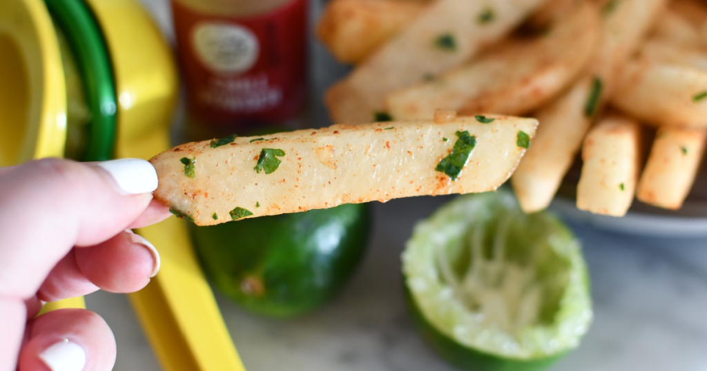 holding jicama fry