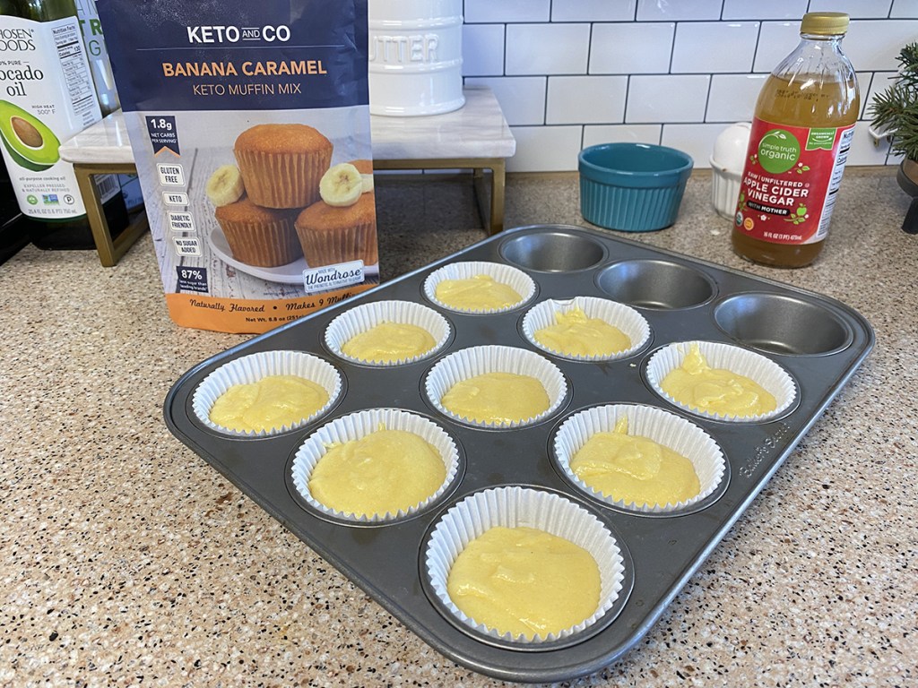 muffin tin with keto and co keto baking mix banana caramel muffins