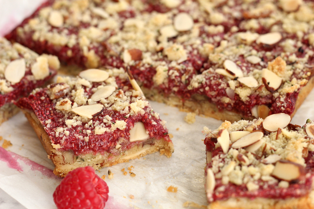 keto raspberry bars sliced up 