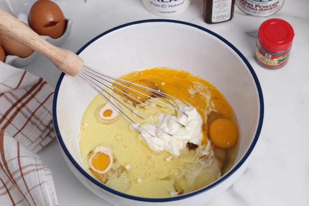wet ingredients in a mixing bowl with whisk