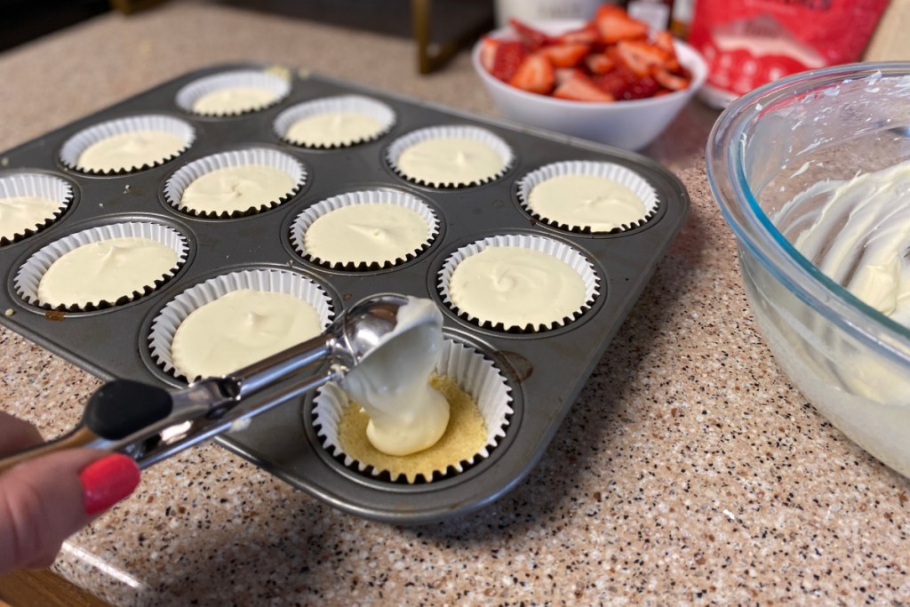 adding cream cheese filling