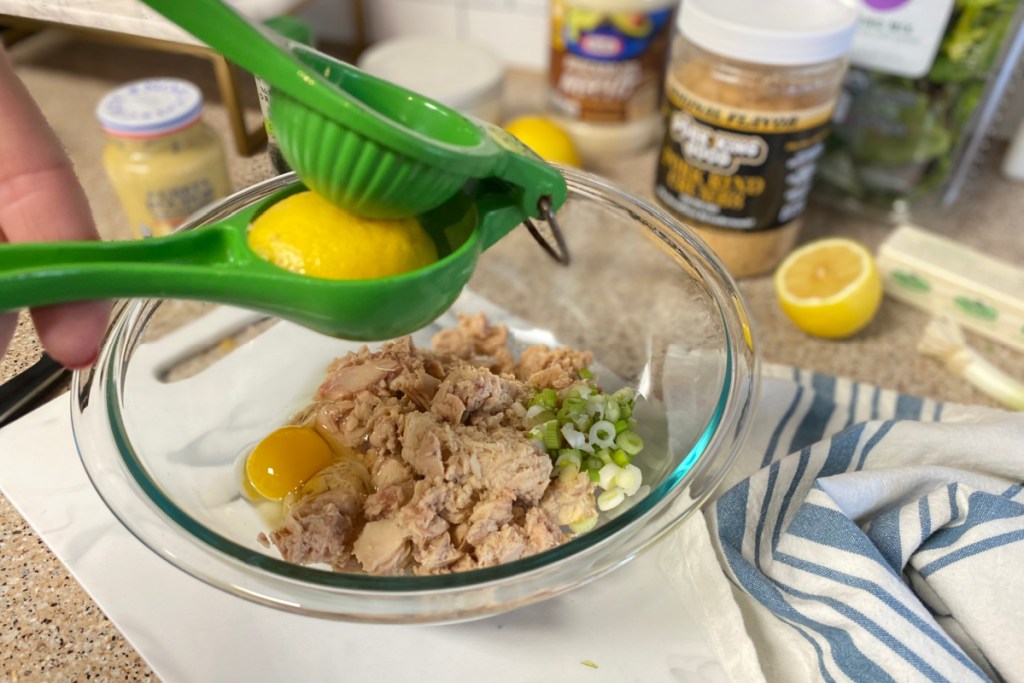 adding lemon juice to mixing bowl