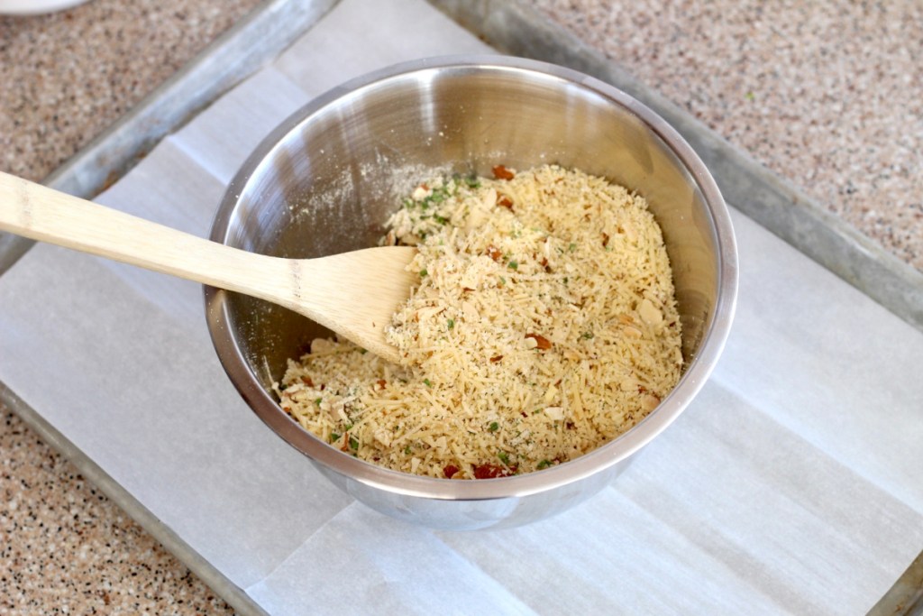 keto sour cream and chive crackers in mixing bowl before being baked