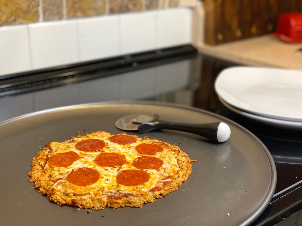 personal pan keto chicken pizza crust with pepperoni 