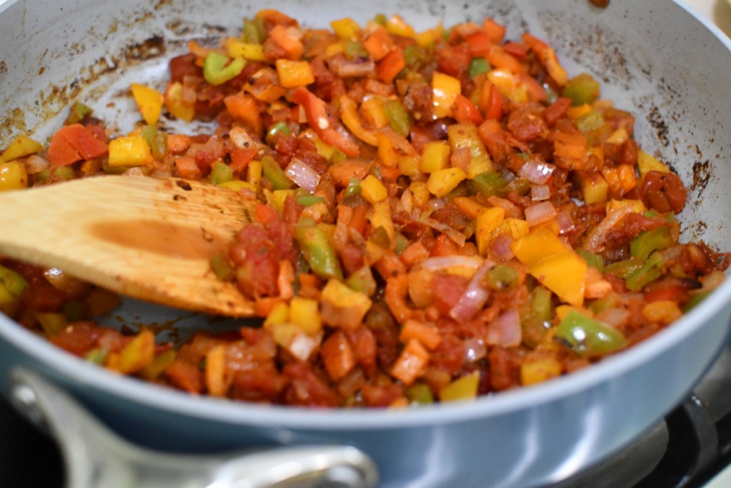 sauteed peppers with rotel in a frying pan