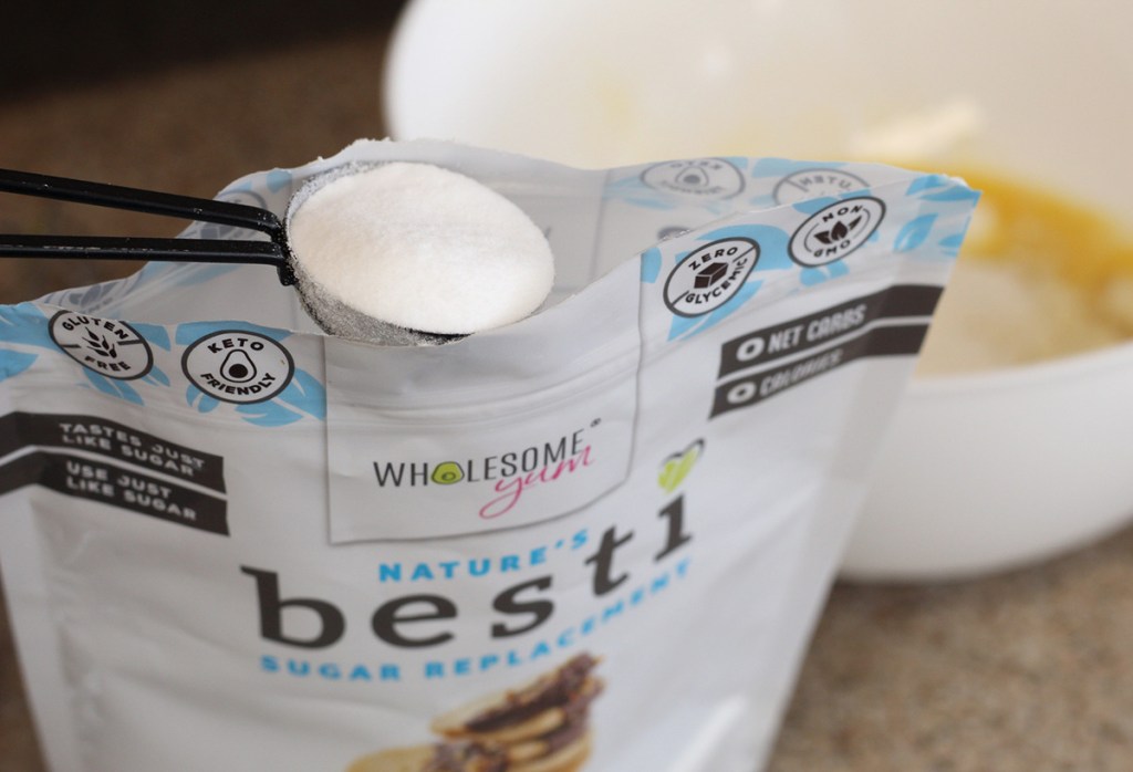 wholesome yum besti keto sweetener with measuring spoon