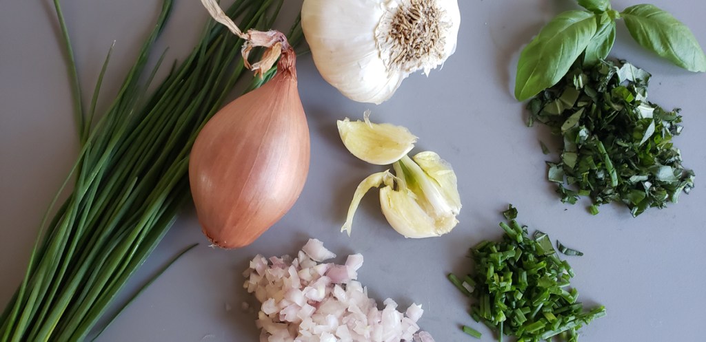 Prepping aromatics for keto pickle juice salad dressing