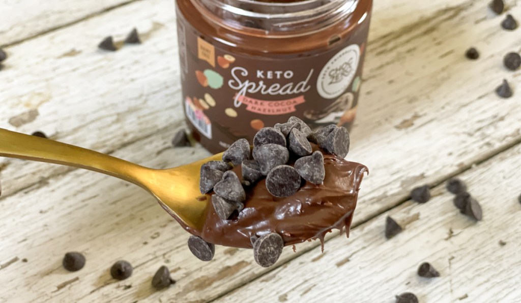 spoonful of choczero dark chocolate sugar free hazelnut spread with chocolate chips on it