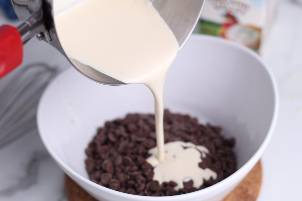 adding hot cream to keto chocolate chips