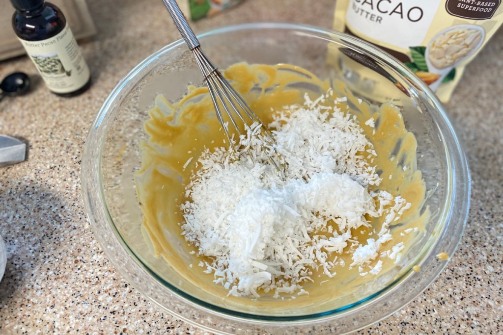 added shredded coconut into mixing bowl
