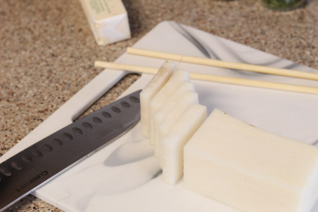 sliced daikon radish on cutting board