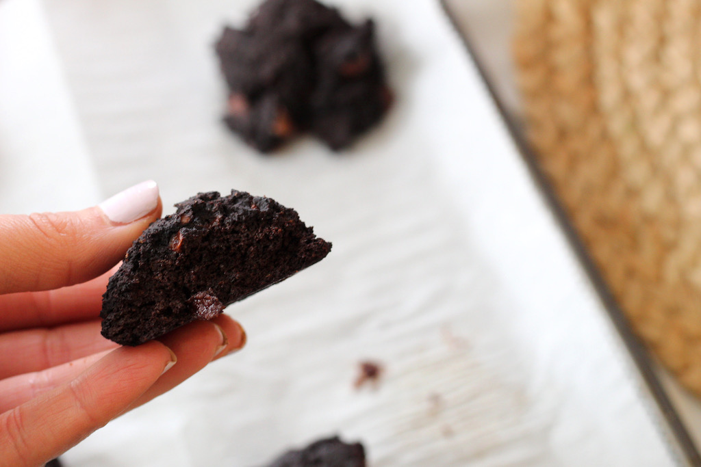 holding keto avocado chocolate cookie 