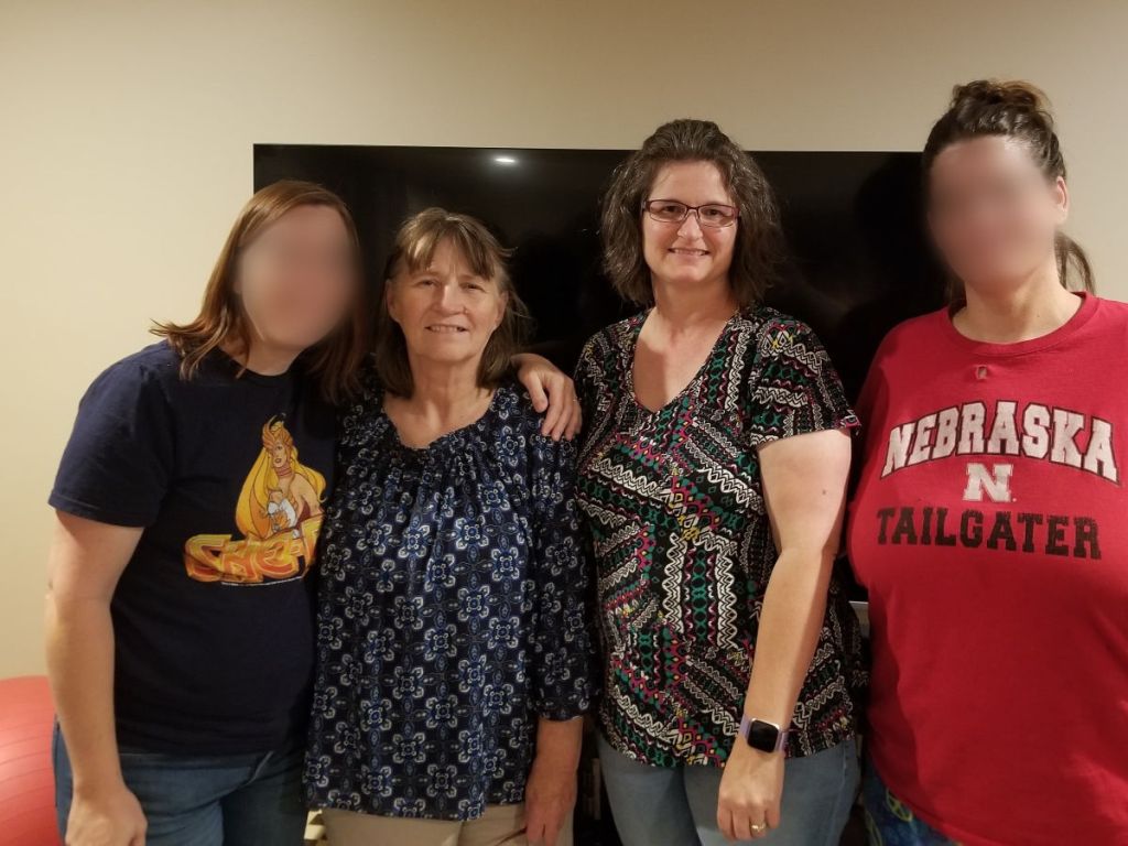 4 women in a family photo