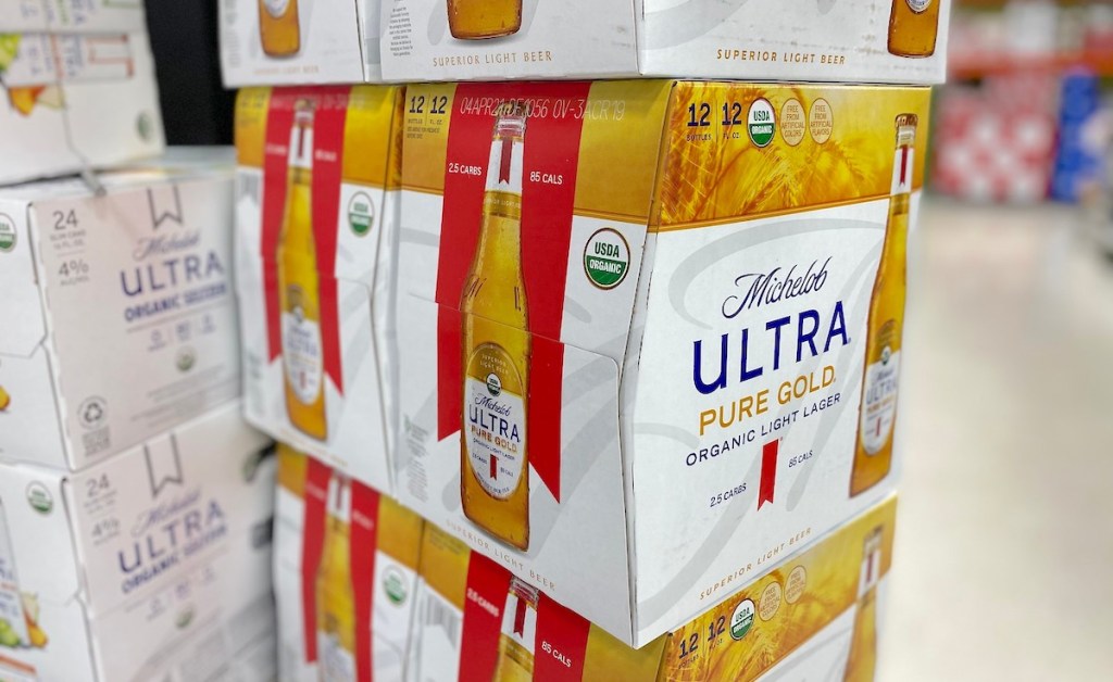 cases of michelob ultra pure gold beer stacked in pile