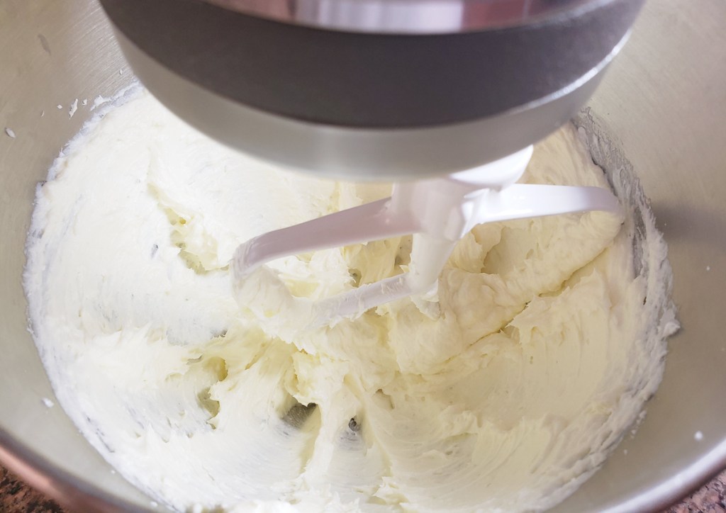cream cheese, butter, and coconut oil in mixer