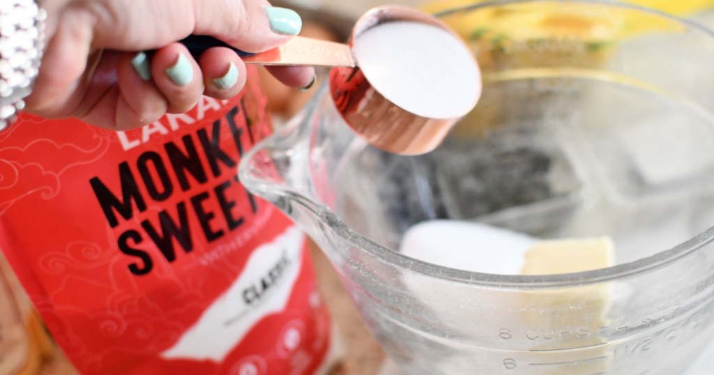 adding monkfruit sweetener to bowl