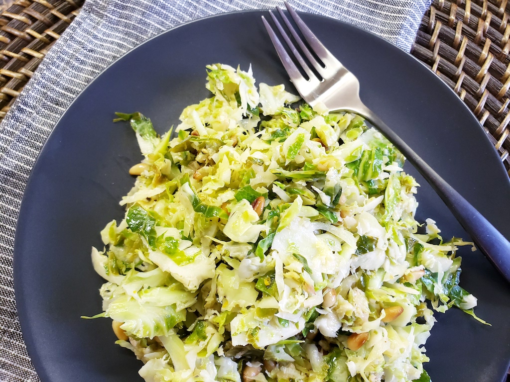 brussels sprout salad on plate with fork